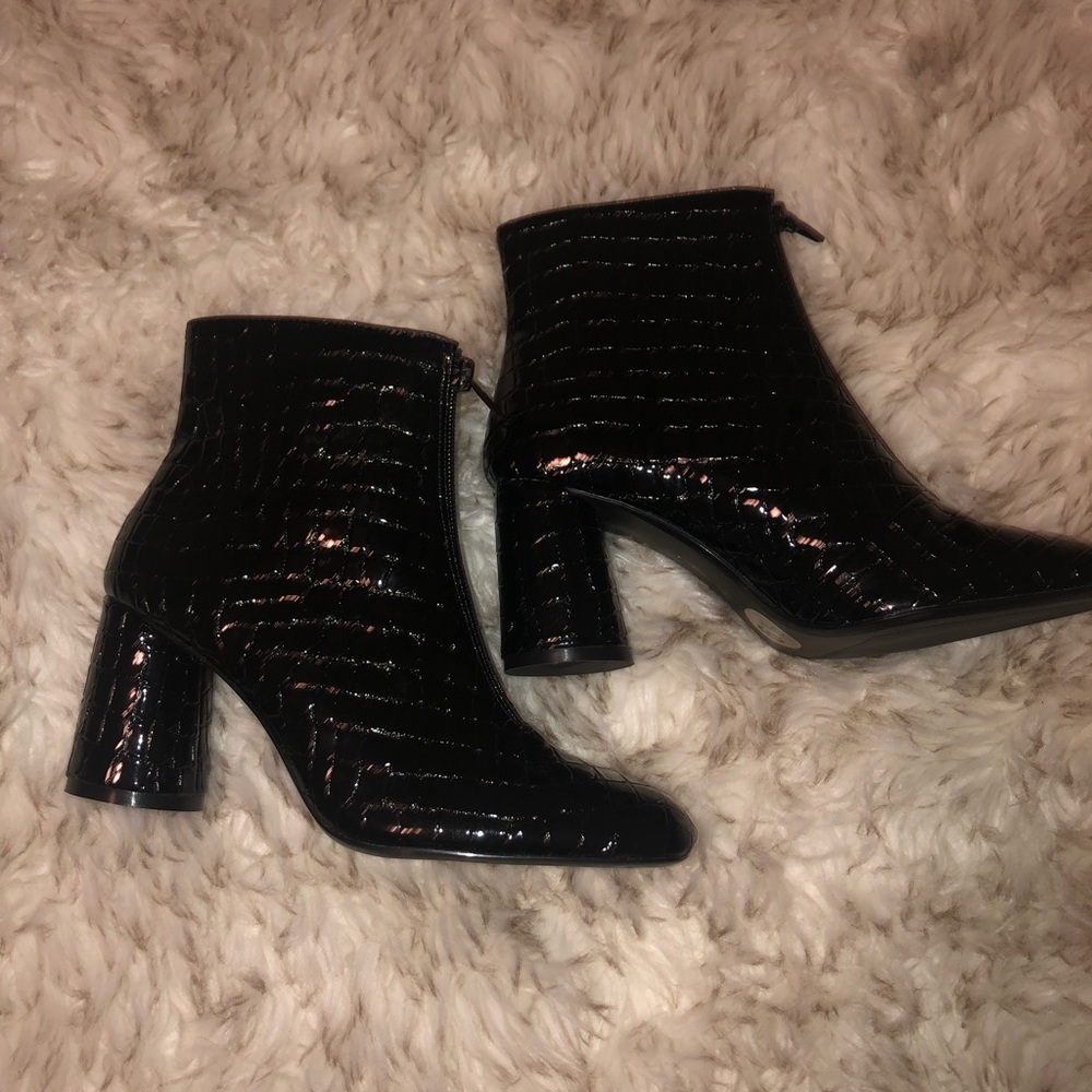 Black shiny boots